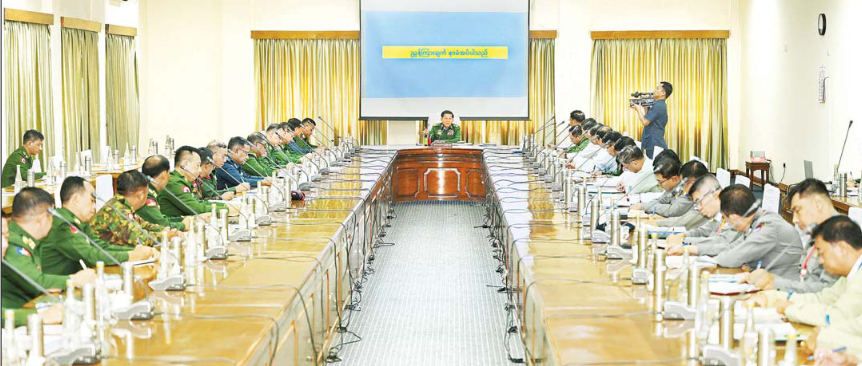 State Administration Council Chairman Prime Minister Senior General Min Aung Hlaing addresses the meeting on security and development of Yangon Region yesterday.