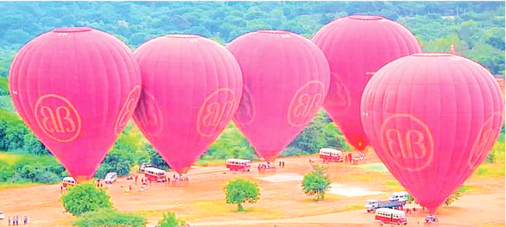 An aerial view of the Bagan Ancient Cultural Zone is seen together with a hot-air balloon and visitors on board. PHOTOS: BOB