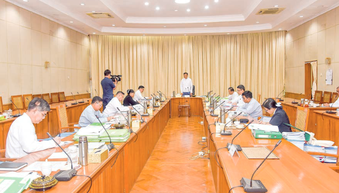 SAC Member Deputy Prime Minister General Mya Tun Oo presides over the eighth meeting of the Myanmar Investment Commission yesterday