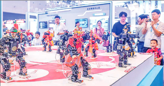 Robots perform dance at a booth during the third Global Digital Trade Expo in Hangzhou, east China’s Zhejiang Province, 25 September 2024. PHOTO: XINHUA