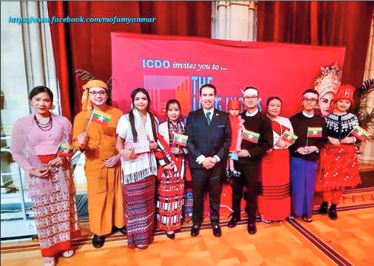 Myanmar Ambassador U Min Thein(C), officials from the Myanmar Embassy and Permanent Representative Office are seen together with performers wearing ethnic national costumes