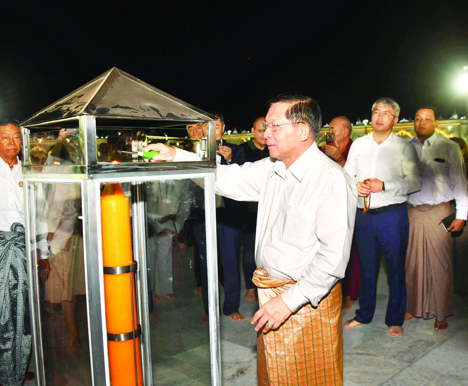 The Senior General and Buryatia Republic Chair from Russia views the stone inscription stupas at Buddha Park of the Maravijaya Buddha Image.