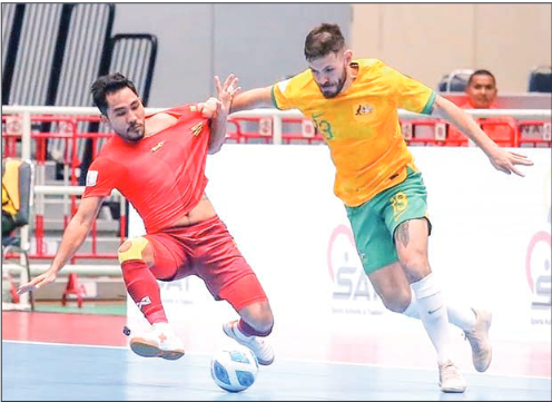 This photo captures a tackle during the Myanmar versus Australia match.