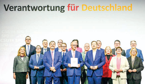 Germany’s CDU/CSU, SPD sign coalition deal for new govt