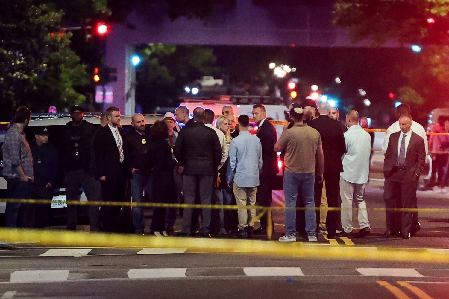 Two Israeli embassy staff shot dead in Washington , suspect held