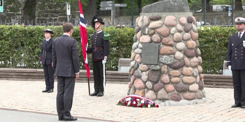French President Macron lays wreath in front of memorial in Norway's Oslo