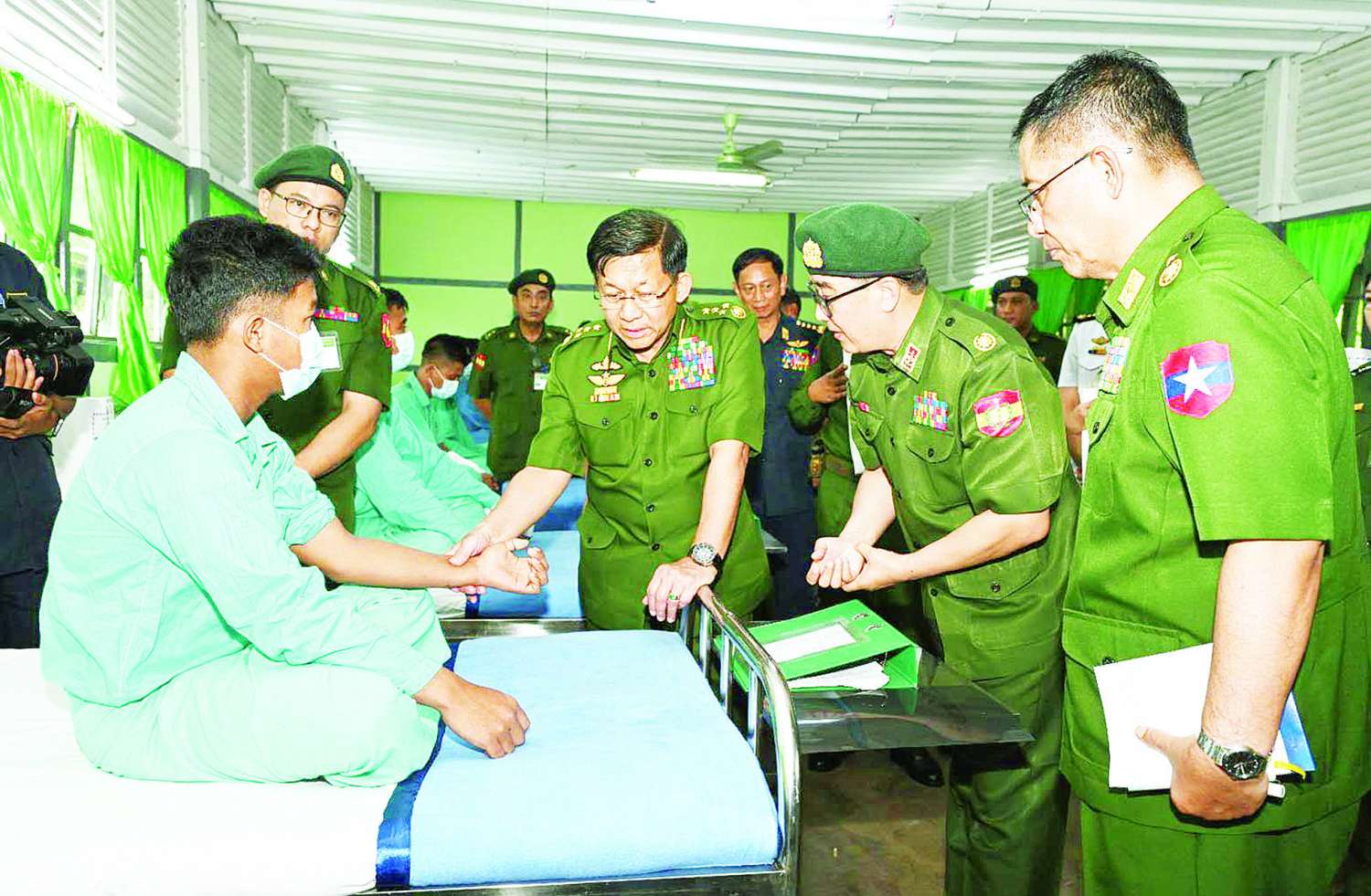 SAC Chairman Defence Services C-in-C Senior General Min Aung Hlaing provides support to Tatmadaw patients at Meiktila Tatmadaw Hospital