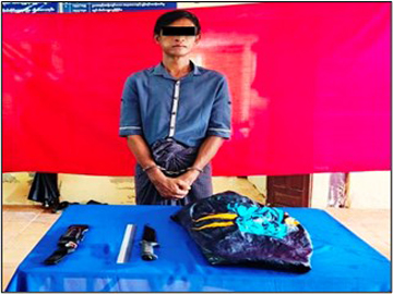 ကရင်ပြည်နယ်၊ ဘားအံမြို့နယ်၌ နေအိမ်အတွင်း ပစ္စည်းခိုးရန်ဝင်ရောက်ကာ မိသားစုဝင် သုံးဦးအား ဓားဖြင့် ထိုးခဲ့သဖြင့် နှစ်ဦး သေဆုံးပြီး တစ်ဦး ထိခိုက်ဒဏ်ရာရရှိမှု ဖြစ်စဉ်မှ တရားခံနှင့် သက်သေခံပစ္စည်းများ၏ မှတ်တမ်းဓာတ်ပုံ။