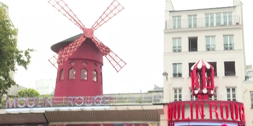 Cycling and French Cancan in front of the Moulin-Rouge in Paris