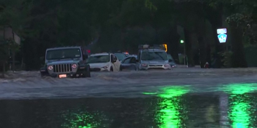 Rescuers help trapped cars after floods hit US state of New Jersey