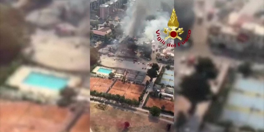 Smoke rises from the area where a petrol station exploded in Rome
