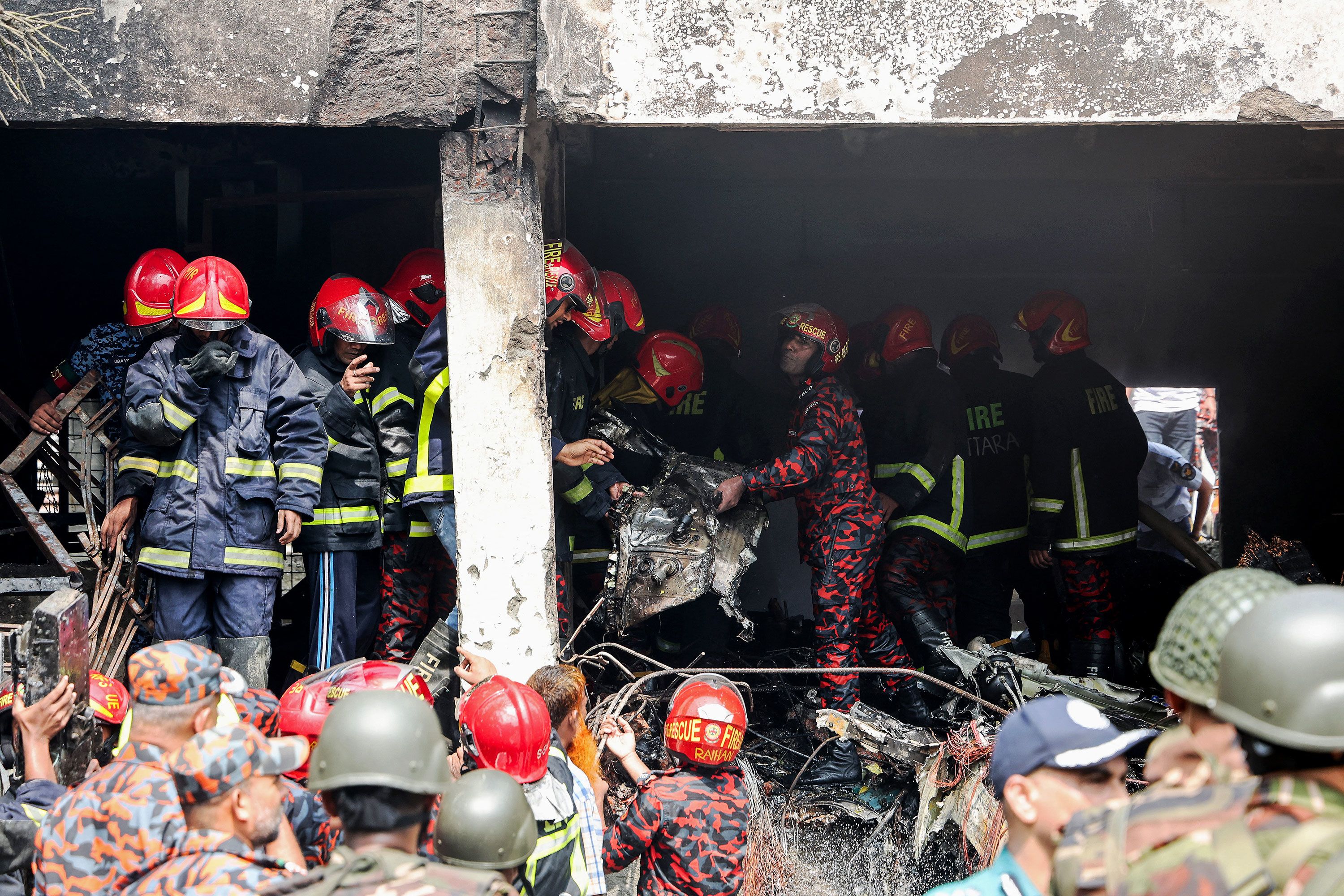 At least 27 killed as Bangladesh air force jet crashes into Dhaka school