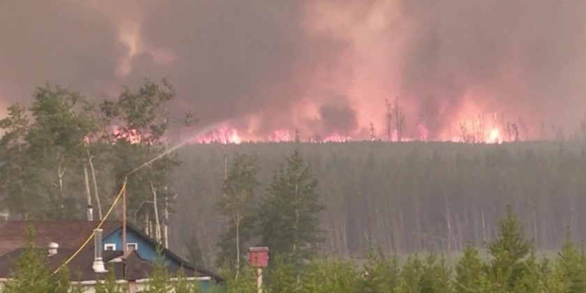 Canada sends troops to eastern province as fire damage grows