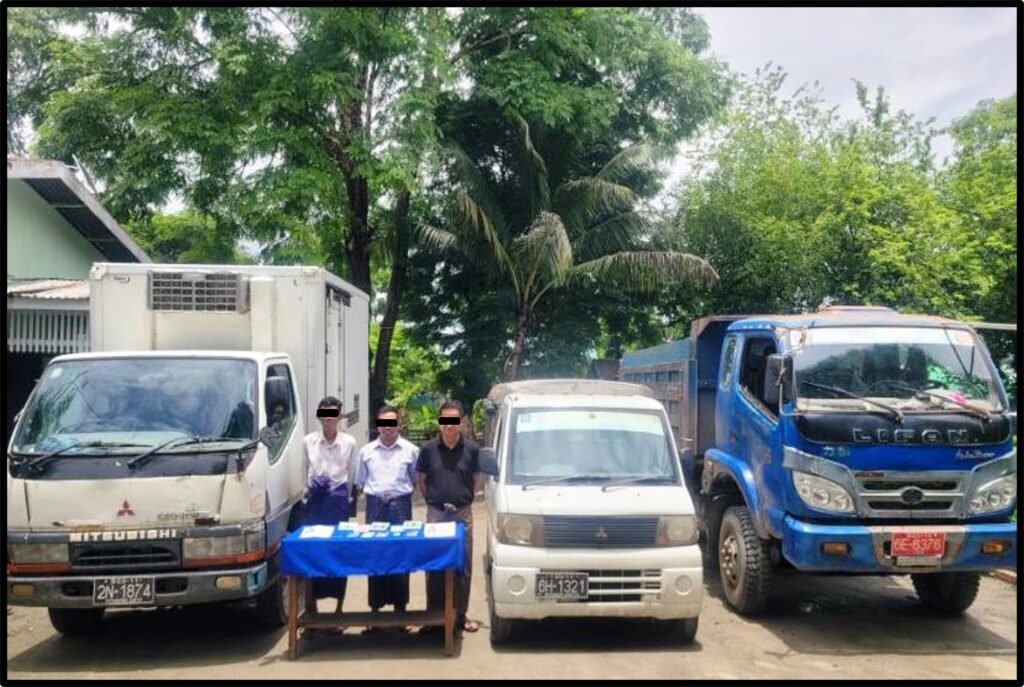 Suspects Myat Min, Kyaw Kyaw Win and Khin Maung Lwin seen with seized stimulant tablets and vehicles.