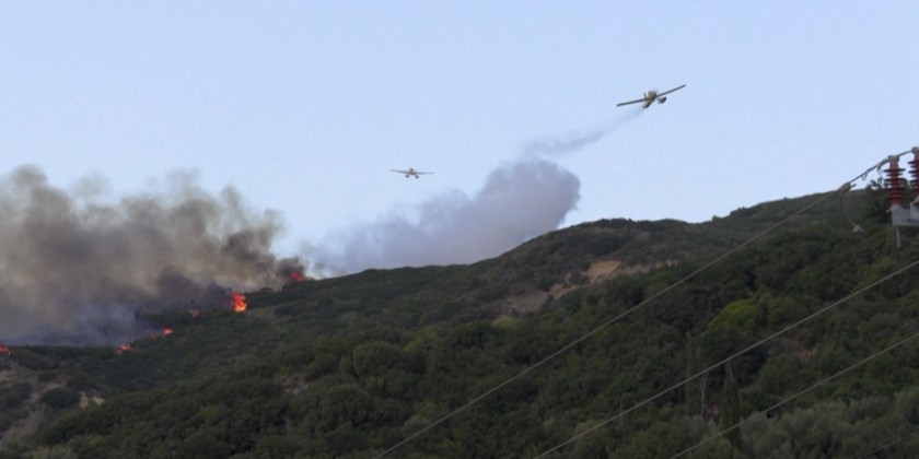 Wildfires rage in Greece as heatwave bakes Europe