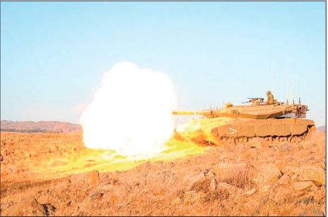 This photo released on 30 September 2024 shows Israeli troops stationed on the Israeli side of the Israel-Lebanon border. PHOTO: ISRAEL DEFENCE FORCES/HANDOUT VIA XINHUA