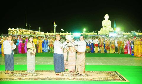 The Senior General and Buryatia Republic Chair from Russia views the stone inscription stupas at Buddha Park of the Maravijaya Buddha Image.