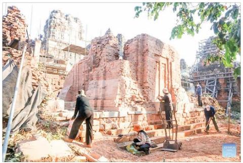 Restoration work on millennium-old brick tower in Cambodia's Angkor Park completed
