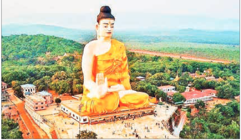 This photo showcases the sitting Buddha statue, the largest in Myanmar and the second largest in the world, located on Phayathonzu Mountain in Kyaikto Township