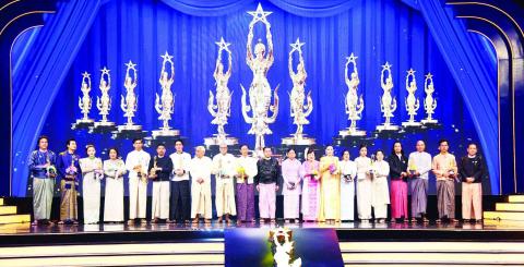 During the ceremony, artistes from MMPO, Myanmar Music Association and Myanmar Theatrical Association performed songs and dances. The Senior General and his wife cordially greeted intellectuals, intelligentsia and artistes from motion picture, literary, theatrical and music arenas. Also present at the ceremony were Daw Kyu Kyu Hla, wife of the Senior General, the Council Joint Secretary, council members and their wives, union-level dignitaries, Union ministers and their wives, regional and state chief minis