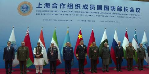 SCO defense Ministers pose for group photo during meeting in China's Qingdao
