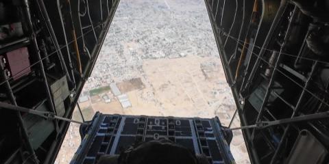 Aid airdropped into Gaza as Israel temporarily halts military operations