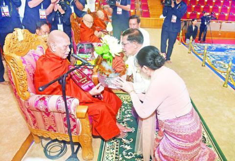 SAC donates Waso robes, marks second anniversary of successfully consecrating Maravijaya Buddha Image