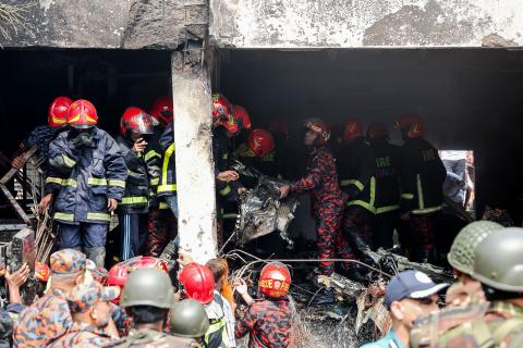 At least 27 killed as Bangladesh air force jet crashes into Dhaka school