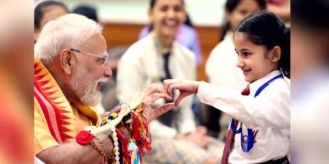 Indian Prime Minister celebrates Raksha Bandhan with school children