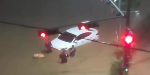 Heavy rain hits airport, floods cars